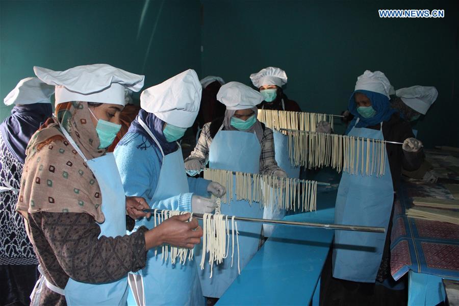 AFGHANISTAN-MAZAR-I-SHARIF-NOODLE FACTORY-WOMEN