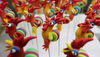 Rooster-shaped dough modellings made to greet Chinese lunar new year