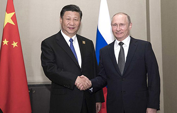 Xi, Putin meet on bilateral ties, SCO development