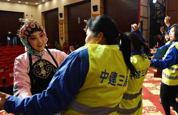 Female construction workers invited to experience Peking opera