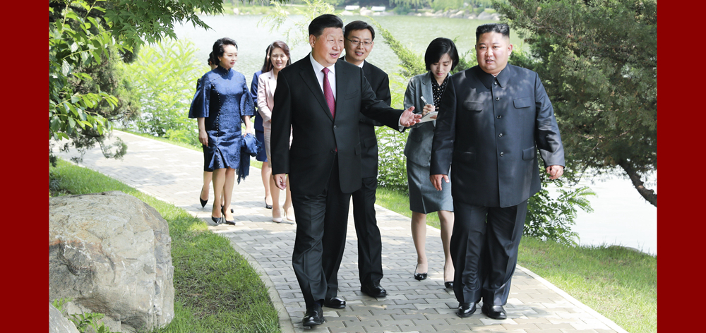 习近平会见朝鲜劳动党委员长、国务委员会委员长金正恩